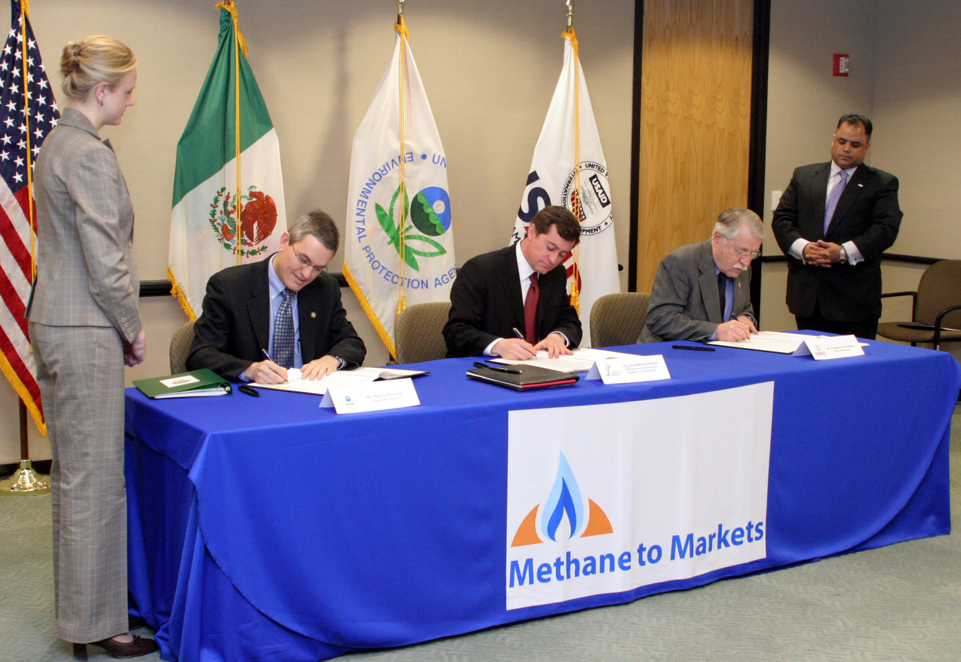 MOU signing ceremony with the Secretariat of Environment and Natural Resources (SEMARNAT) in Mexico, U.S. EPA Deputy Administrator, and U.S. Agency for International Development Acting Administrator, 2005. <br><span class='small text-muted'>(2005, Washington, D.C., United States)</span>